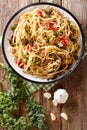 Italian lunch of pasta with cabbage kale, bacon, tomatoes and pa