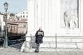 Italian man reads the morning newspaper, Venice
