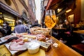 Italian meat plate and drink on table at outdoor bar Royalty Free Stock Photo