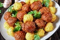 Italian meatballs and pasta balls on a plate Royalty Free Stock Photo