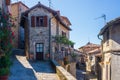 Italian medieval village details, historical stone alley, ancient marrow street, old city stone buildings architecture. Santa