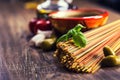 Italian and Mediterranean food ingredients on old wooden background. Royalty Free Stock Photo