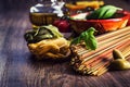 Italian and Mediterranean food ingredients on old wooden background. Royalty Free Stock Photo