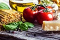 Italian and Mediterranean food ingredients on old wooden background. Royalty Free Stock Photo