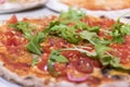 Italian and Mediterranean pizza, with tomato end fresh rocket
