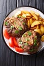 Italian menu: braised veal Ossobuco steak with fried potatoes an