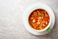 Italian minestrone soup in bowl on gray stone background Royalty Free Stock Photo