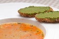 Italian minestrone soup with pesto crostini on side Royalty Free Stock Photo