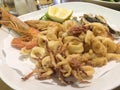 Italian Mixed fried fish, shrimp and squid platter Royalty Free Stock Photo