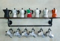 Italian moka pot coffee maker hang on the cement wall Royalty Free Stock Photo