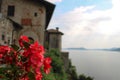 Floreal view of a cloister overlooking the lake during a cloudy day