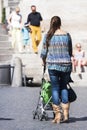 Italian mother and baby in a pram