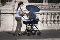 Italian mother and baby in a pram