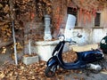 An italian motocycle Vespa. Autumn in Rome City. Italy