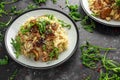 Italian Mushroom risotto with parmesan cheese and wild rocket on top. Royalty Free Stock Photo