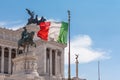 Italian national flag in front of Altare della Patria Royalty Free Stock Photo