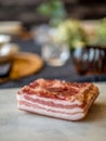 Italian pancetta, seasoned bacon. Pork belly curated meat. Royalty Free Stock Photo