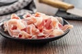 Italian panchetta. Sliced smoked bacon on plate Royalty Free Stock Photo