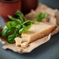 Italian Parmigiano-Reggiano cheese with basil