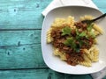 Italian Pasta Asciutta. Fusilli with Sauce Bolognese.