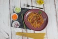 Italian pasta bolognese. Spaghetti and tomato sauce with minced meat and fresh basil on a black background. Royalty Free Stock Photo