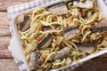 Italian pasta bucatini with sardines, fennel, raisins and pine n Royalty Free Stock Photo