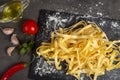 Italian pasta cooking process. Fresh food concept. Home made tagliatelle Royalty Free Stock Photo