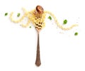 Italian pasta design. A fork with long fusilli, a fried mushroom, pepper and parsley