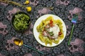 Italian pasta dish with a lot of basil, tomato sauce and grated cheese Royalty Free Stock Photo