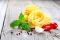 Italian pasta fettuccine nest with garlic, Royalty Free Stock Photo