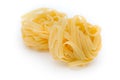 Italian pasta fettuccine nest isolated on white background Royalty Free Stock Photo