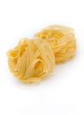 Italian pasta fettuccine nest isolated on white background Royalty Free Stock Photo
