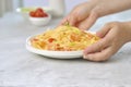 Italian pasta fettuccine with shrimps in white bowl on gray table. Close up beautiful picture homemade national cuisine