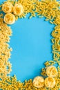 Italian pasta frame on blue table background top view mock up Royalty Free Stock Photo