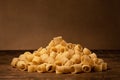 Italian Pasta High quality photo, on a wooden ancient table uncooked Italian cuisine Royalty Free Stock Photo