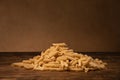 Italian Pasta High quality photo, on a wooden ancient table uncooked Italian cuisine Royalty Free Stock Photo