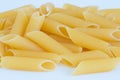 Italian pasta macaroni isolated on white background. Detail of the texture Royalty Free Stock Photo