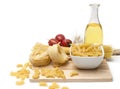 Italian pasta, macaroni quills with cherry tomatoes and olive oil in a glass bottle Royalty Free Stock Photo