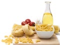 Italian pasta, macaroni quills with cherry tomatoes and olive oil in a glass bottle Royalty Free Stock Photo