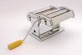 Italian pasta machine at white background