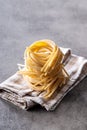 Italian pasta nest. Uncooked spaghetti nest