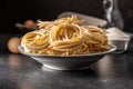 Italian pasta nest. Uncooked spaghetti nest in plate