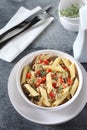 Italian pasta penne salad with tuna, bell pepper and capers Royalty Free Stock Photo