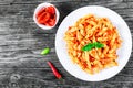 Italian Pasta Penne with Sun-Dried Tomato Pesto, top view Royalty Free Stock Photo