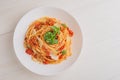 The Italian pasta spaghetti Bolognese on white plate on wooden table. Top view. Royalty Free Stock Photo