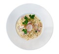 Italian pasta spaghetti carbonara with fried bacon in ceramic plate top view isolated on white background, clipping path Royalty Free Stock Photo