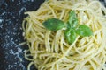 Italian pasta spaghetti with homemade pesto sauce and basil leaf Royalty Free Stock Photo