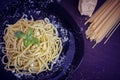 Italian pasta spaghetti with homemade pesto sauce and basil leaf Royalty Free Stock Photo