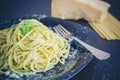 Italian pasta spaghetti with homemade pesto sauce and basil leaf Royalty Free Stock Photo