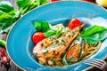 Italian pasta spaghetti with seafood, langoustine, mussels, squid, scallops, shrimp, Parmesan cheese, Royalty Free Stock Photo